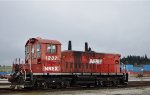Roster shot of NREX 1237, idling on a track in Brownsville.
